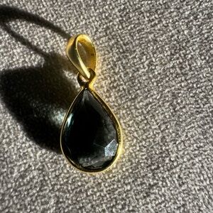 Elegant Gold and Black Teardrop Pendant
